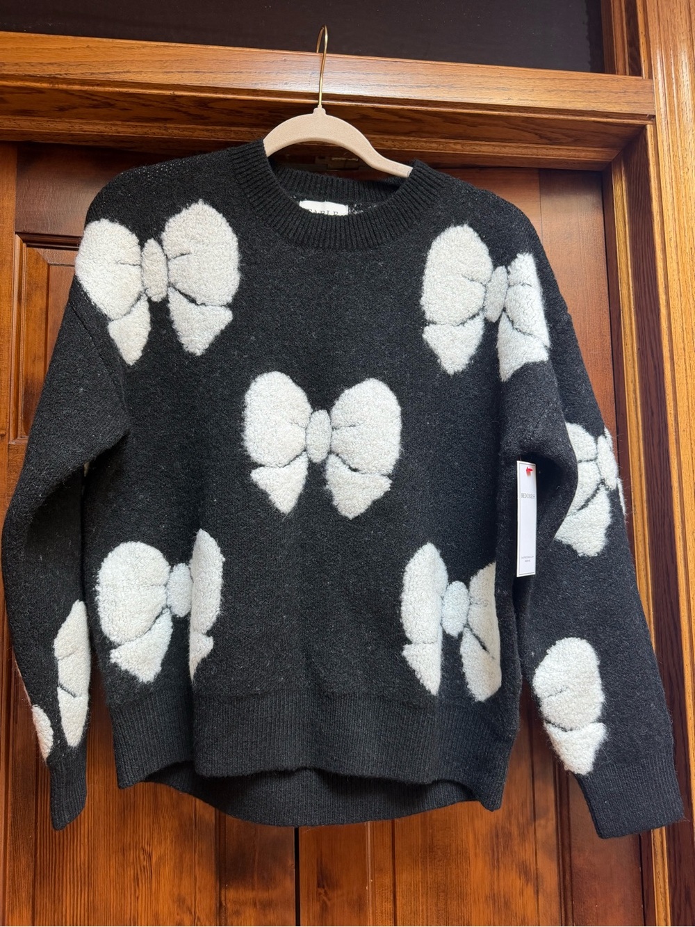 Fable Black/Ivory Sweater with Ivory Bow Pattern, Size M/L